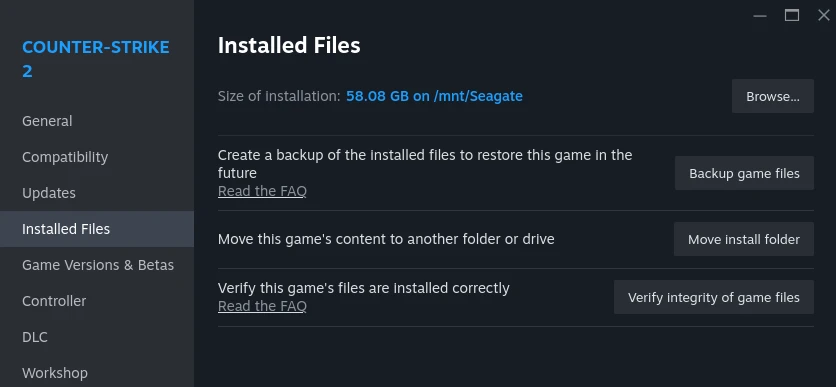 Steam CS2 Properties showing Installed Files tab with Verify integrity of game files button