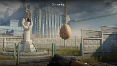 Speckled brown Chicken Egg in the CS2 inspect view against a map background