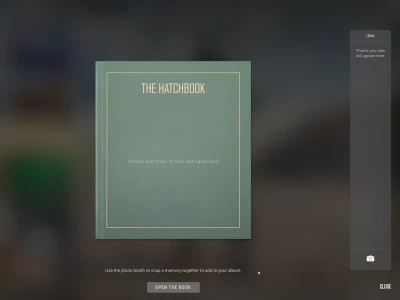 The HatchBook in the CS2 main menu: a green cloth-bound book titled The HatchBook with the line The life and times of your pet name here, an Open the Book button and an empty photo library on the right