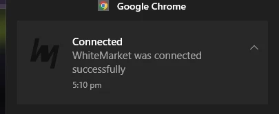 Chrome notification showing the White.Market extension connected successfully